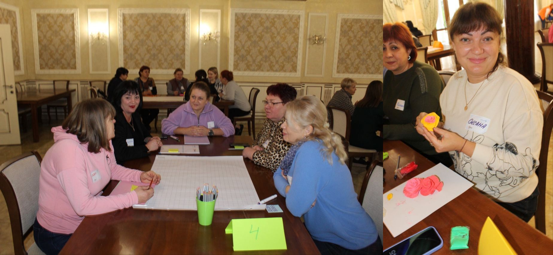 Група жінок бере участь у заході в залі з високими стелями: частина сидять за великим столом, а одна жінка, що посміхається, тримає виріб з пластиліну і зображена наближено праворуч.