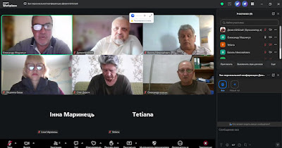 Скриншот онлайн-наради на платформі Zoom Workplace, де режим відображення змінено на загальну сітку учасників. Основний простір займають шість активних відеотрансляцій та дві заставки без увімкнених камер. У верхньому ряду перше вікно ліворуч належить Олександру Маснагуту; воно виділене зеленою рамкою як активне джерело звуку. Поруч розташовані трансляції учасників з іменами Держлісгосп (чоловік із бородою у білій сорочці) та Василь Миколайович (чоловік у світлій тенісці). У другому ряду розміщені вікна Людмили Басок в окулярах, Олега Дарича, який дивиться донизу, та Олександра на тлі документів. Третій ряд відображає лише текстові імена користувачів Інна Маринець та Tetiana на чорному тлі. У правій частині екрана розгорнуто панель «Учасники», де зафіксовано список присутніх, а під ним міститься вікно для обміну повідомленнями.